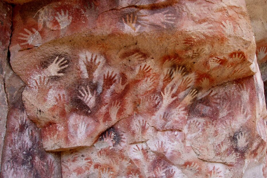 Cave art at Cueva de las Manos, Perito Moreno, Argentina. The art in the cave is dated between 13,000 and 9,000 BP by UNESCO; stenciled, mostly left hands are shown.